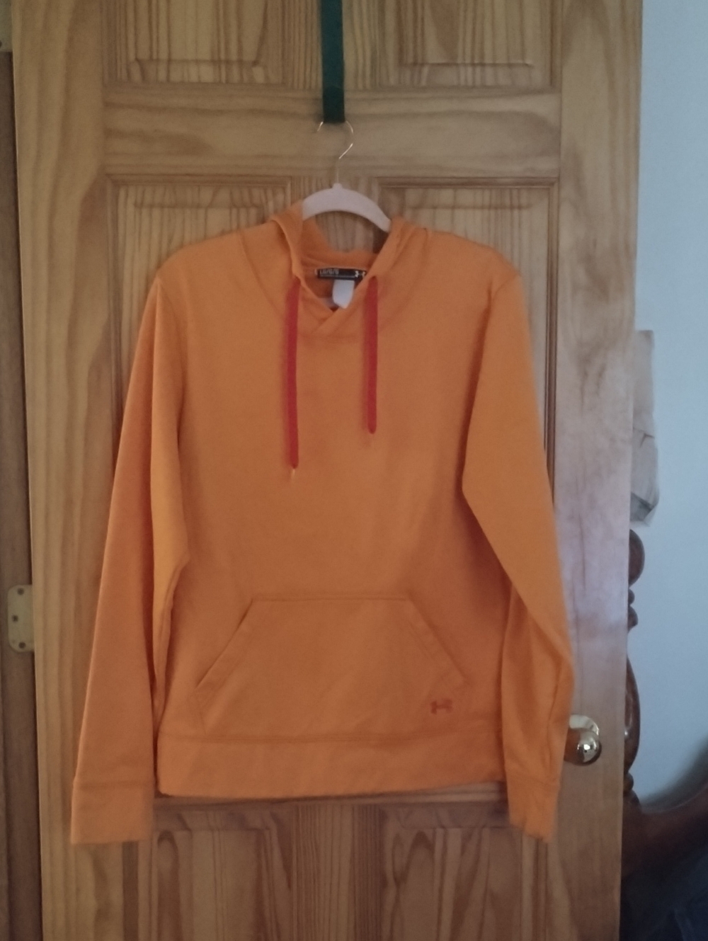 Under Armour Orange Pullover Hoodie with Red Drawstrings